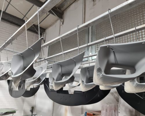 RIM Moulded Air Ducts Going Through Paint Process